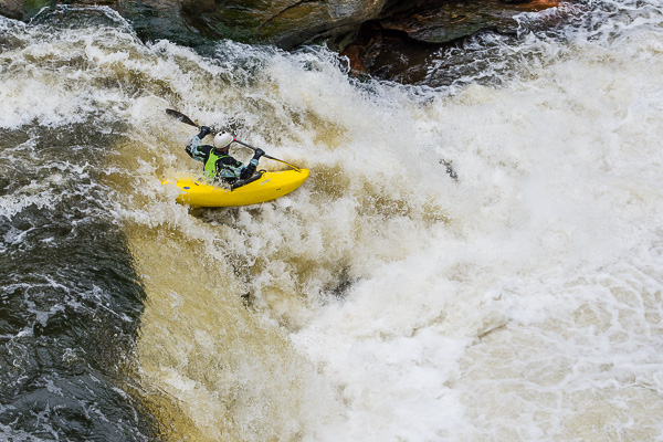 Kayaker running Staircase Falls
